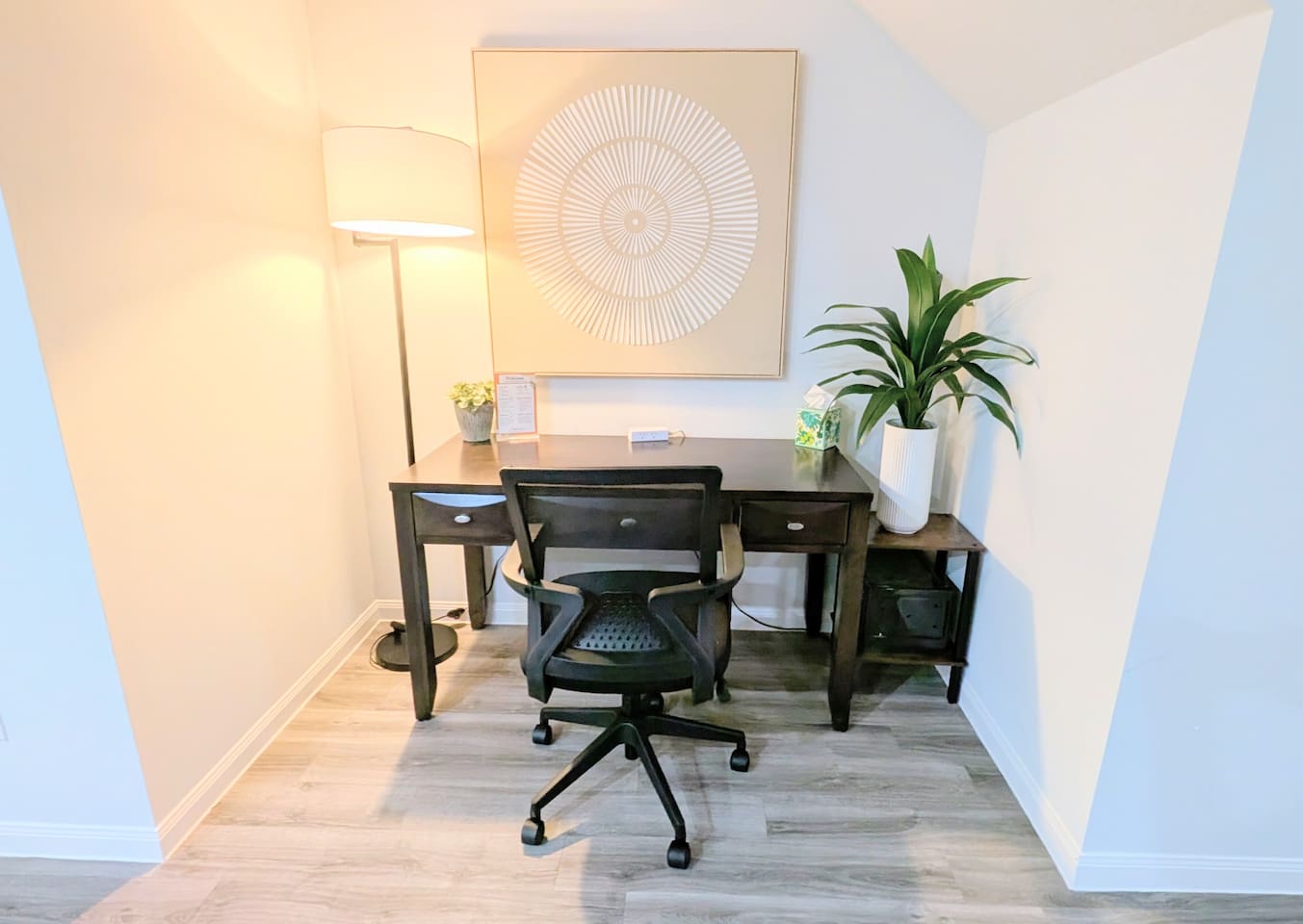This work space nook includes WiFi access, easy charging ports and a full size desk for your work needs. 