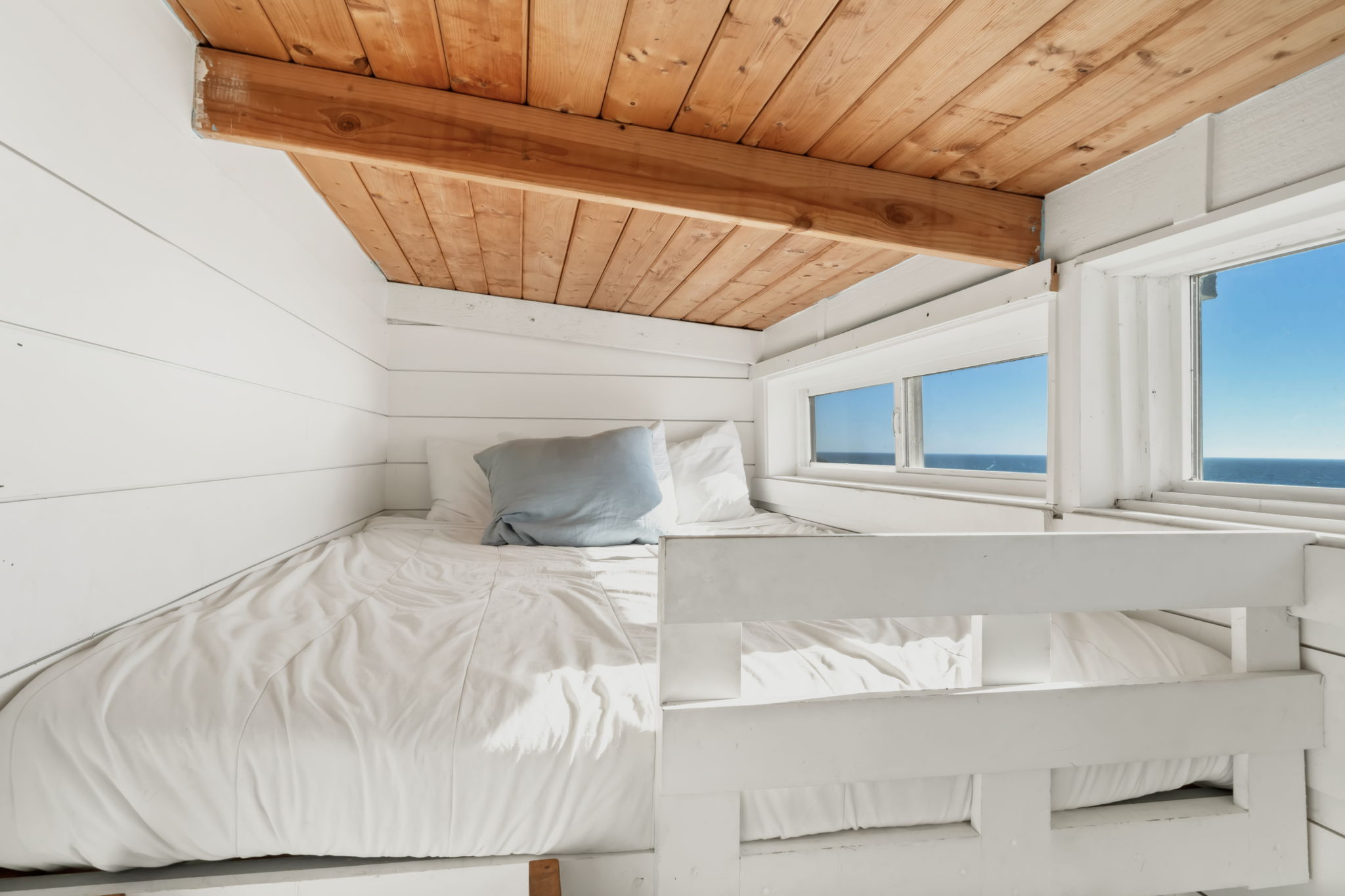 Queen size bed in the “Crows Nest” has one of the best views in the house!
