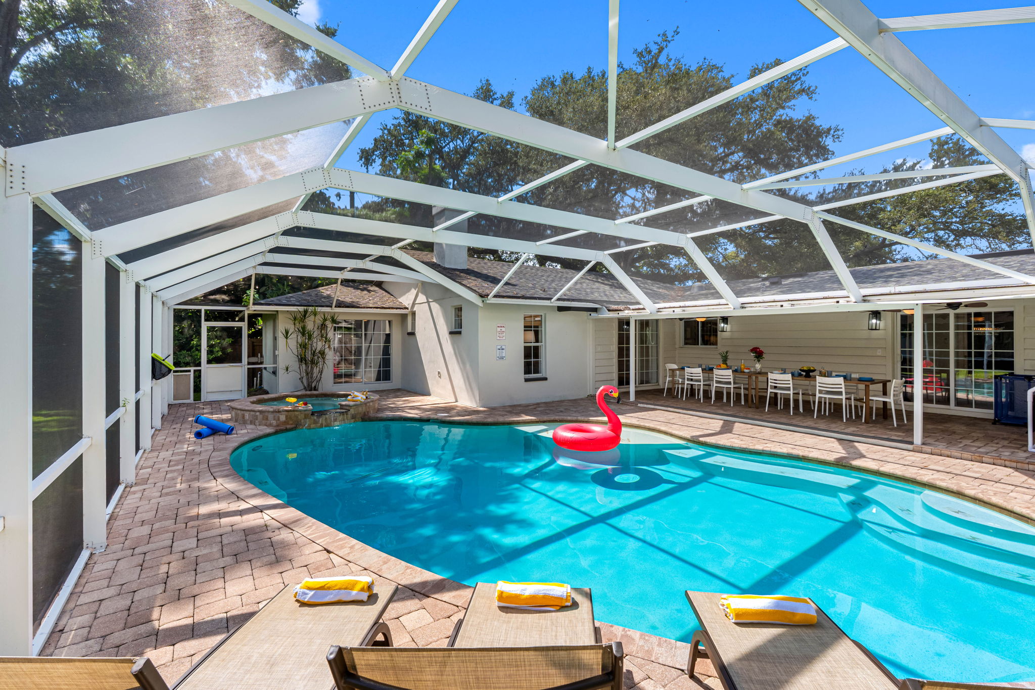 Screened pool enclosure offers year-round enjoyment without worry of pests.
