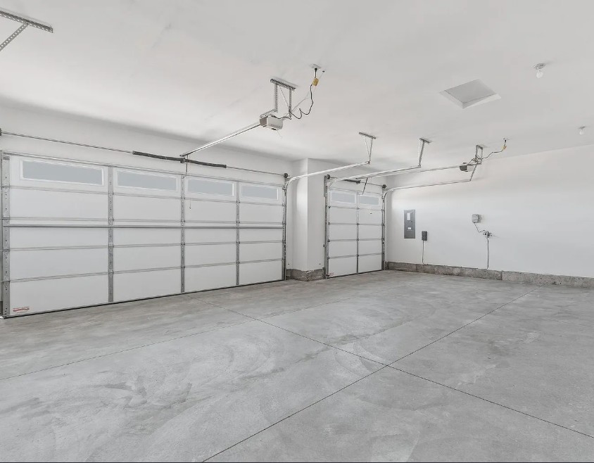 Spacious three-car garage with direct access into the home and convenient entry to the back patio.