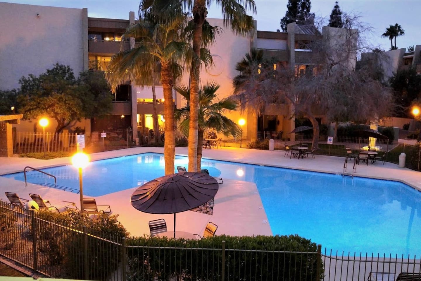 Enjoy this beautiful view of the resort style pool from the comfortable balcony.