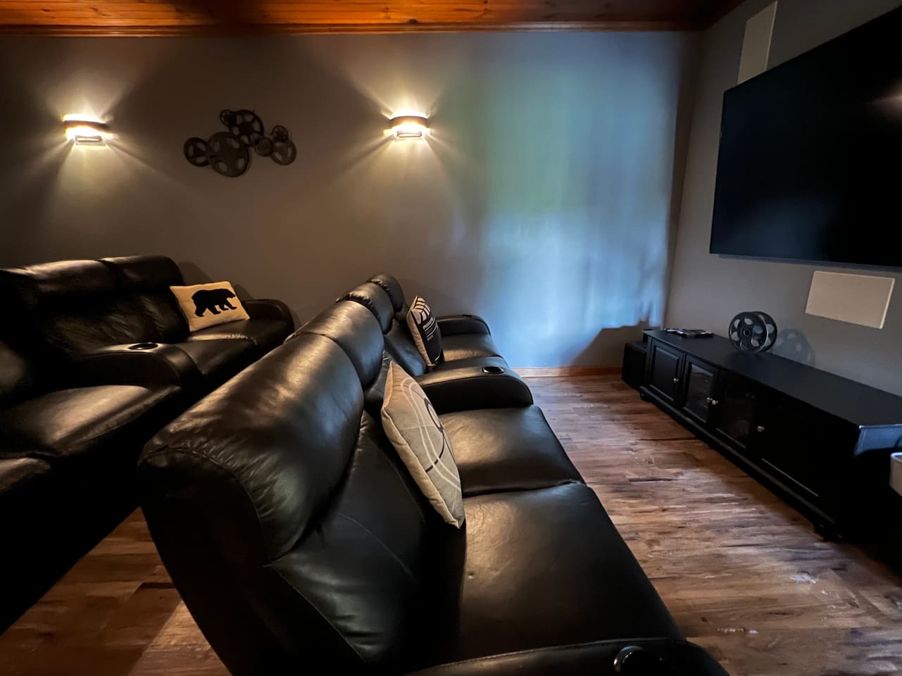 Movie night is on in the theater room! Featuring 3 rows of reclining seats (last row not pictured here). Private theater room is adjacent to rec room with pool table & more.