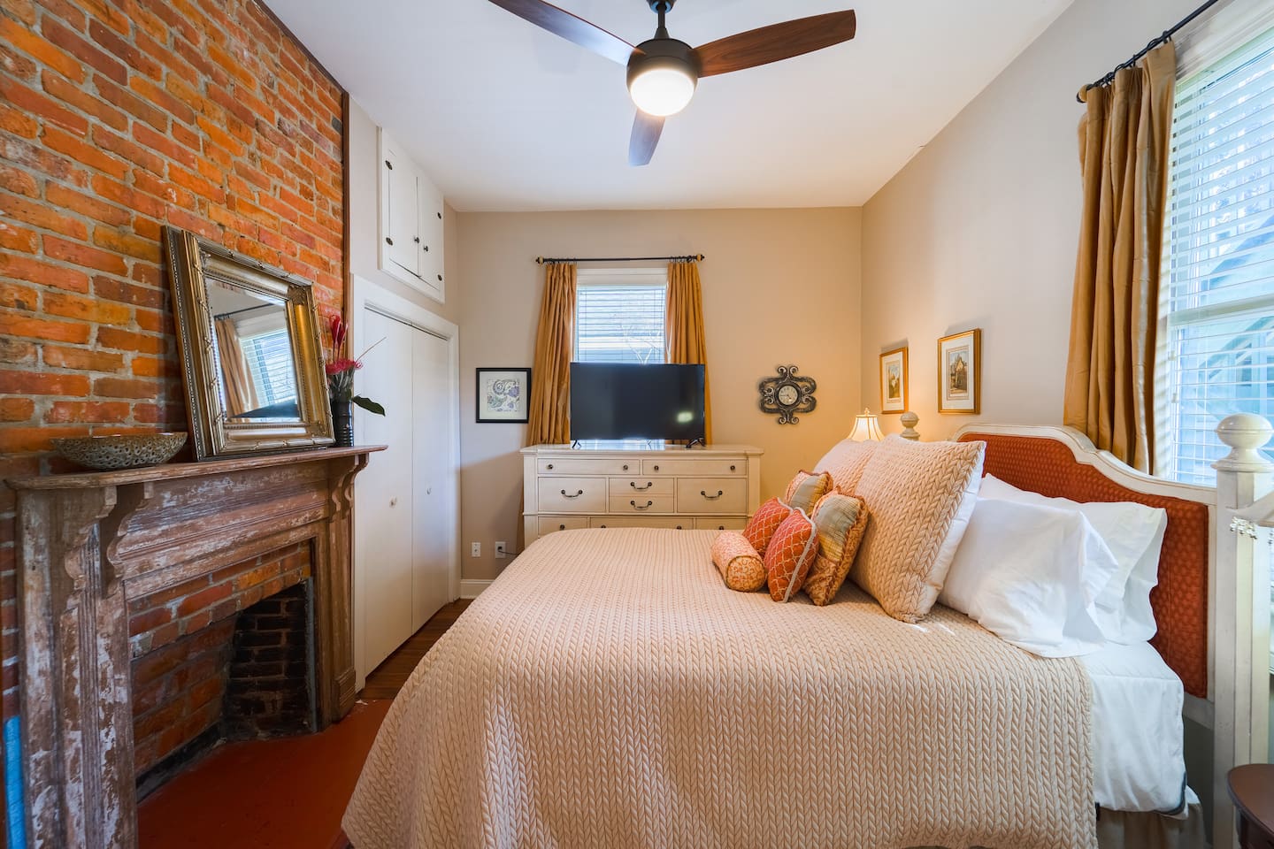 Brick Faced and non-working fireplace for that historical feel. Large closet for all of your hanging clothes. New ceiling fans throughout.