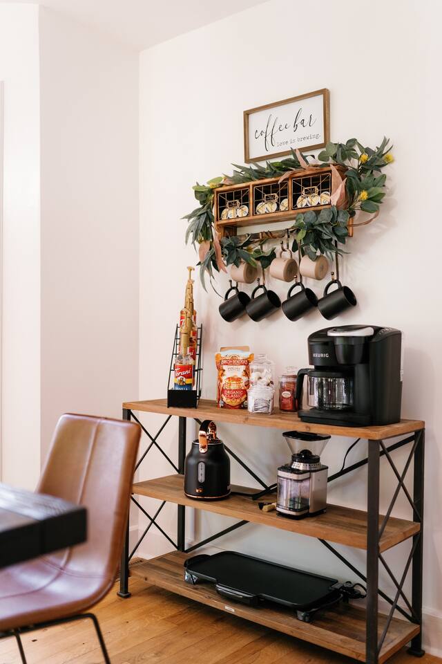 Coffee Bar with organic coffee, tea, flavored syrups and condiments for that perfect morning drink!