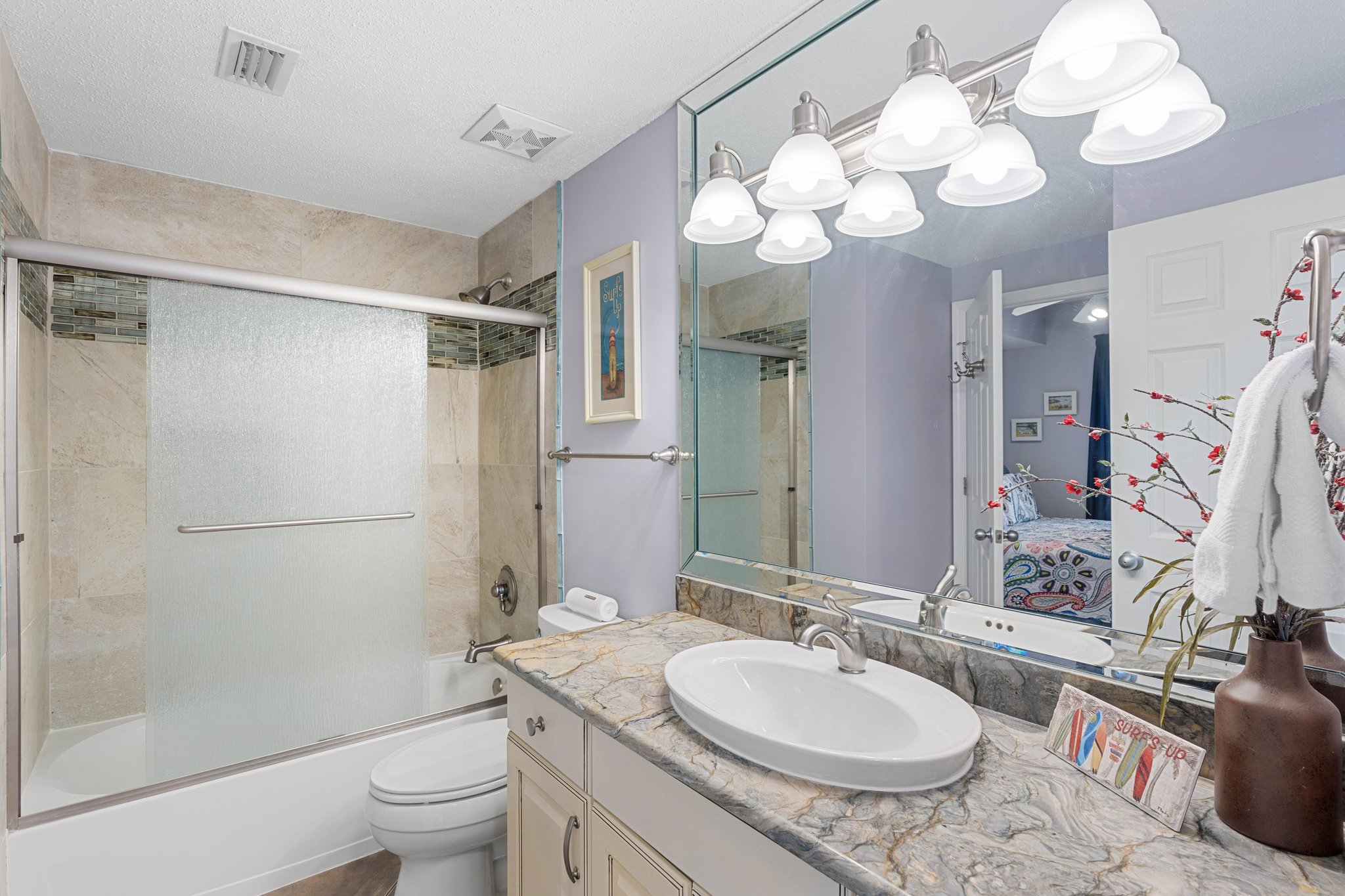Spacious condo bathroom w/ extended vanity & plenty of room to get ready.