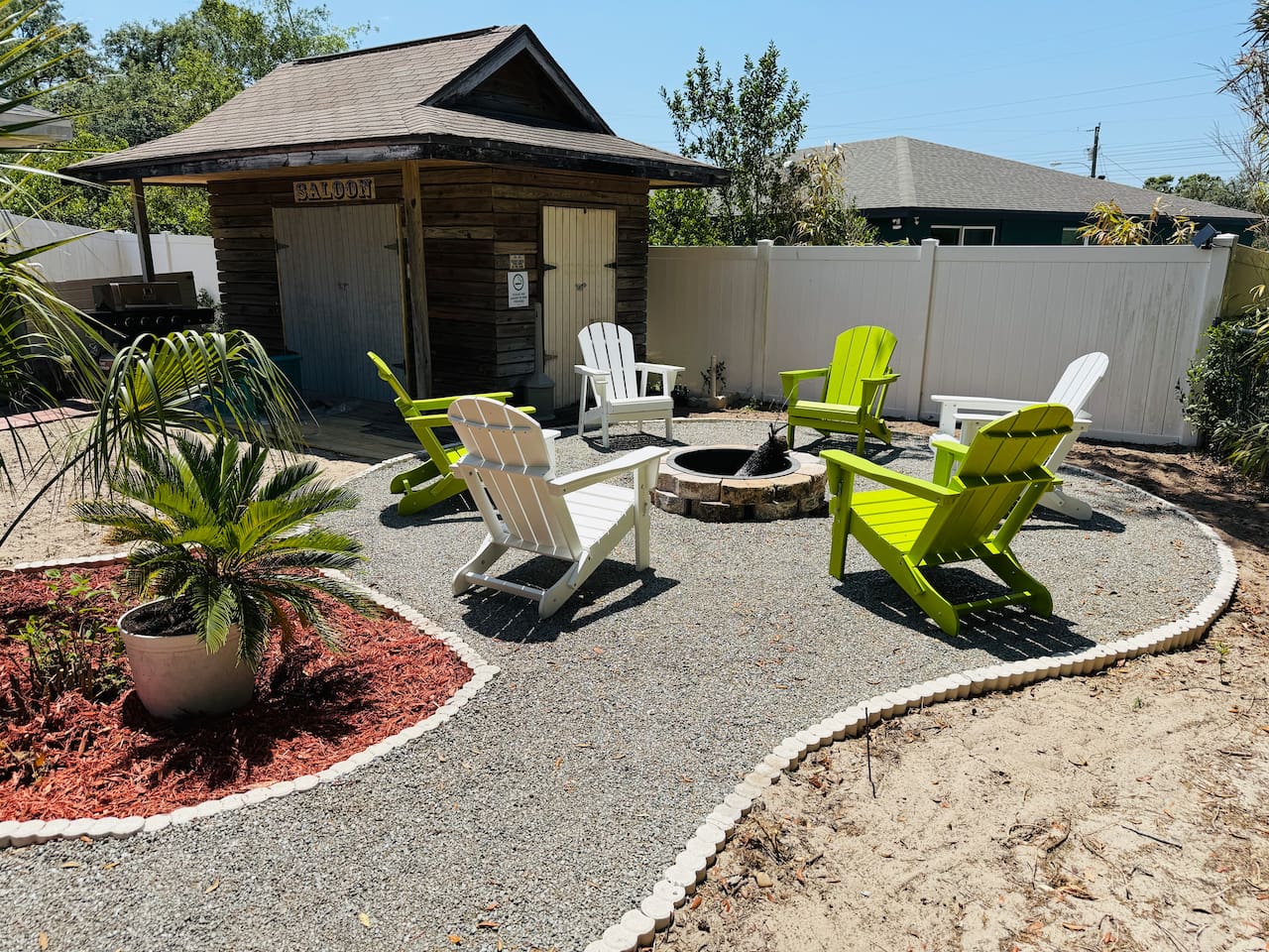 Warm up by the fire in our whimsical outdoor lounge area. This cozy fire pit area is the perfect spot for evening chats, stargazing, or roasting marshmallows by the light of the flames.