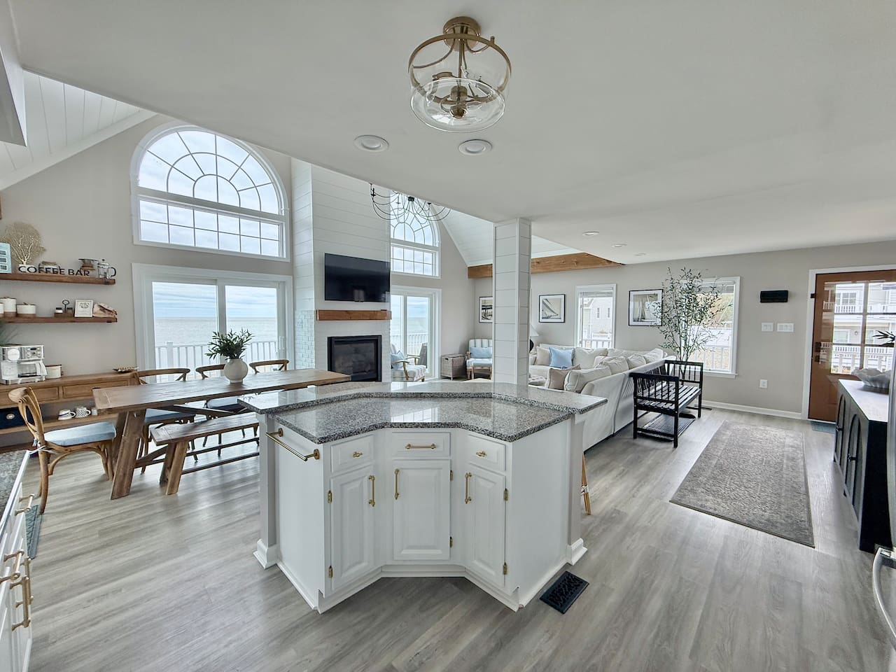 Step into this expansive, open-concept haven designed for shared joy. With its seamless flow from the modern kitchen to the inviting living area, it is the perfect destination for friends and family to relax and vacation in style.