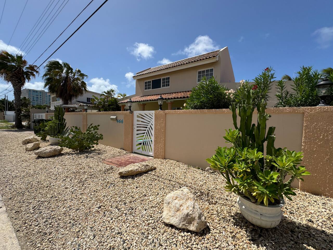 Gated yard with on street parking.