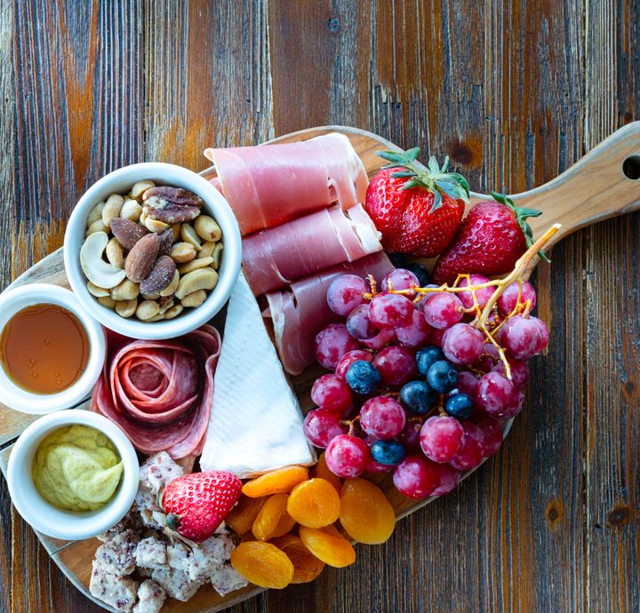 Luxury welcome charcuterie board with local cheeses and fruit at Windy Haven cabin in Blue Ridge GA