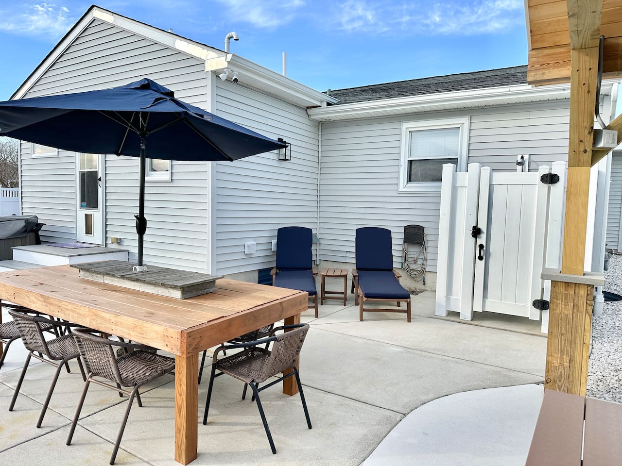 Rinse off the salt and sand in our convenient outdoor shower after a day at the beach. This private patio also features comfy loungers and a large dining table for the ultimate vacation relaxation.