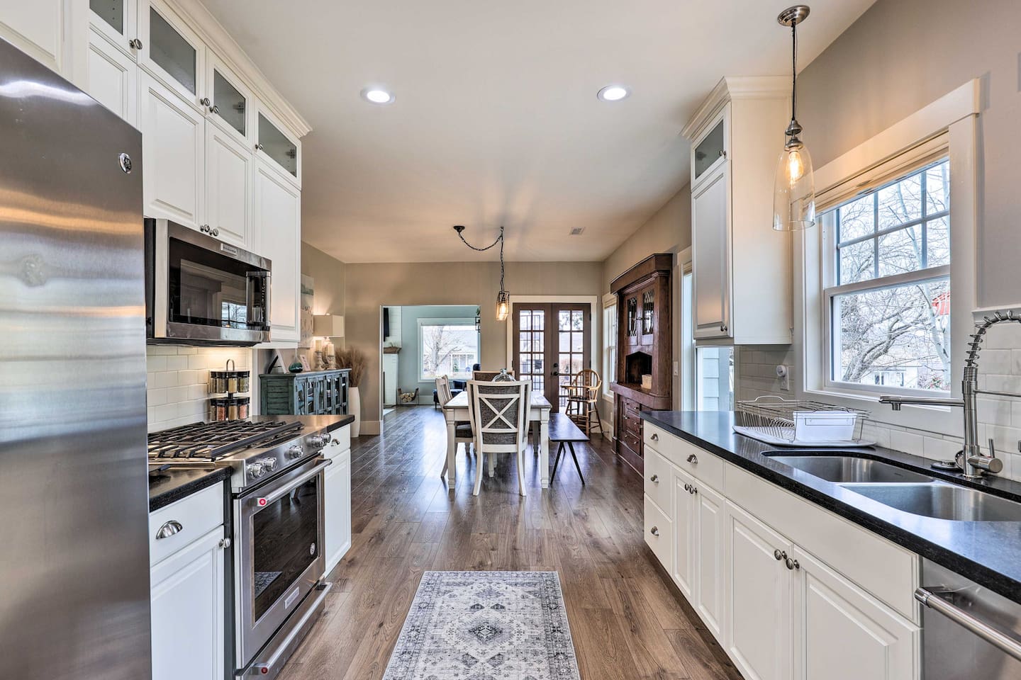 An easy flow from stove to table means no one misses the conversation while dinner's cooking.