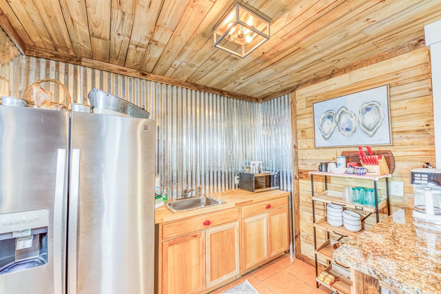 Kitchen: Rustic charm meets modern convenience in this stylish culinary haven!