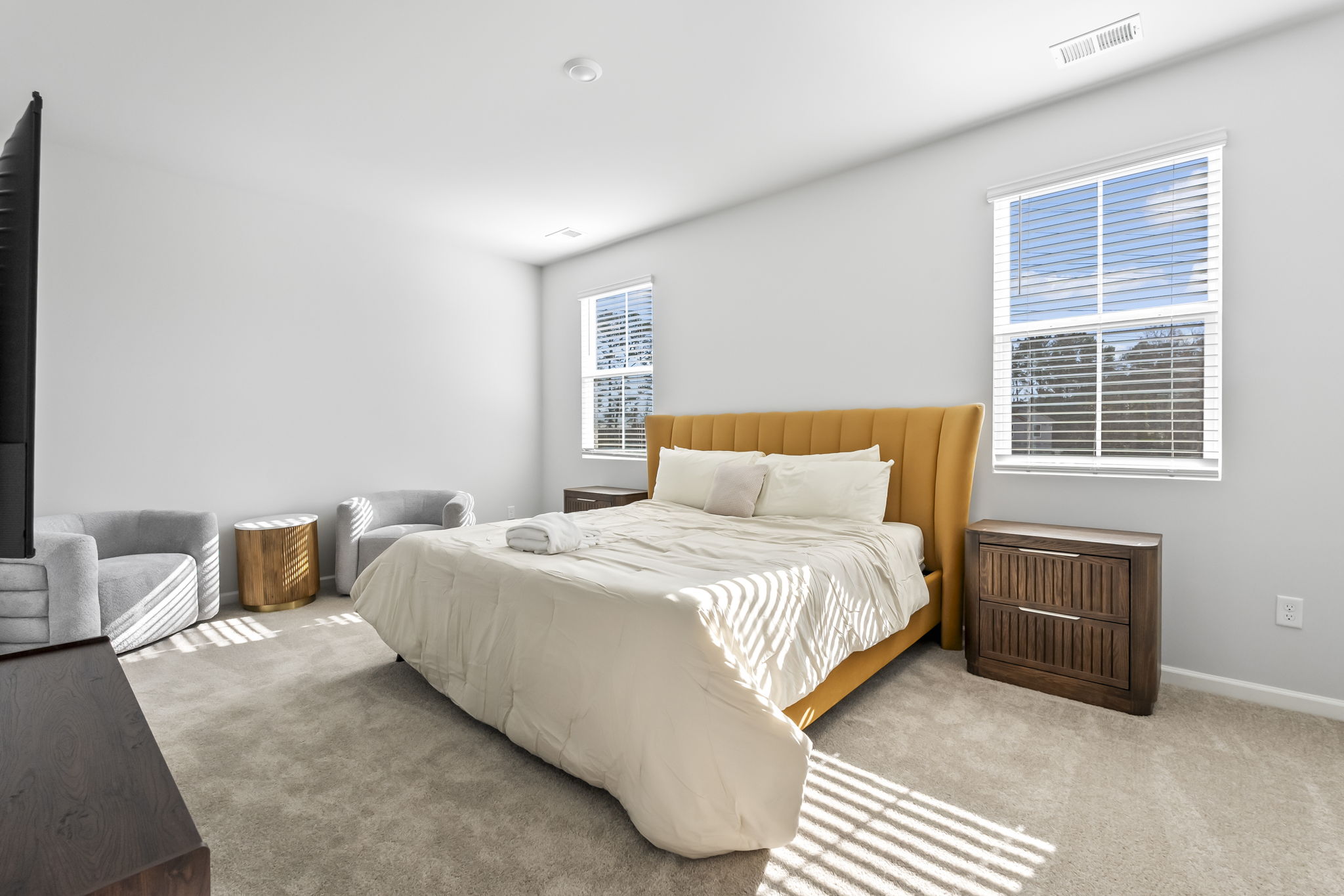 Primary Bedroom with King Bed, ensuite bathroom and large walk in closet