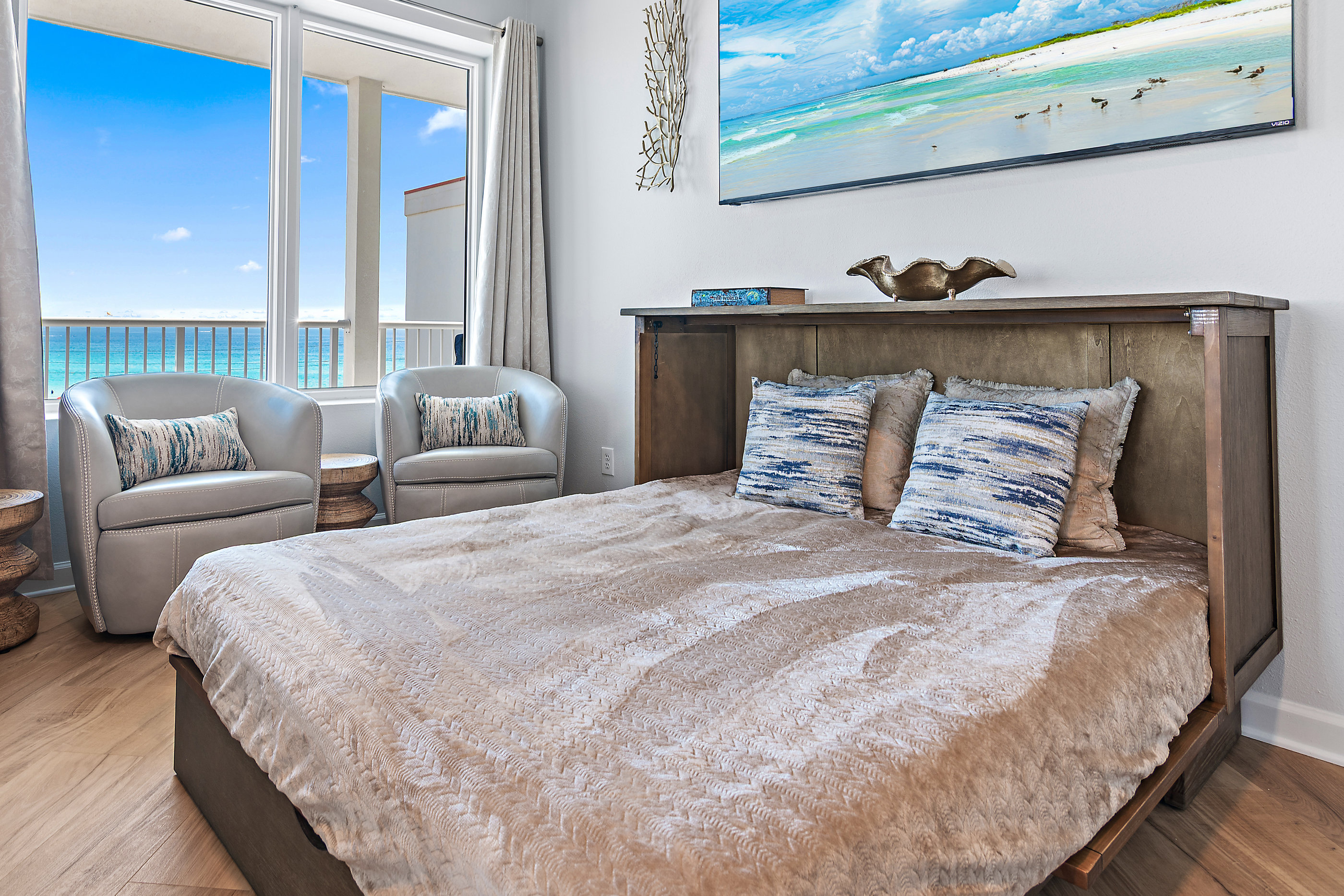 Queen Murphy bed in living room for additional sleeping