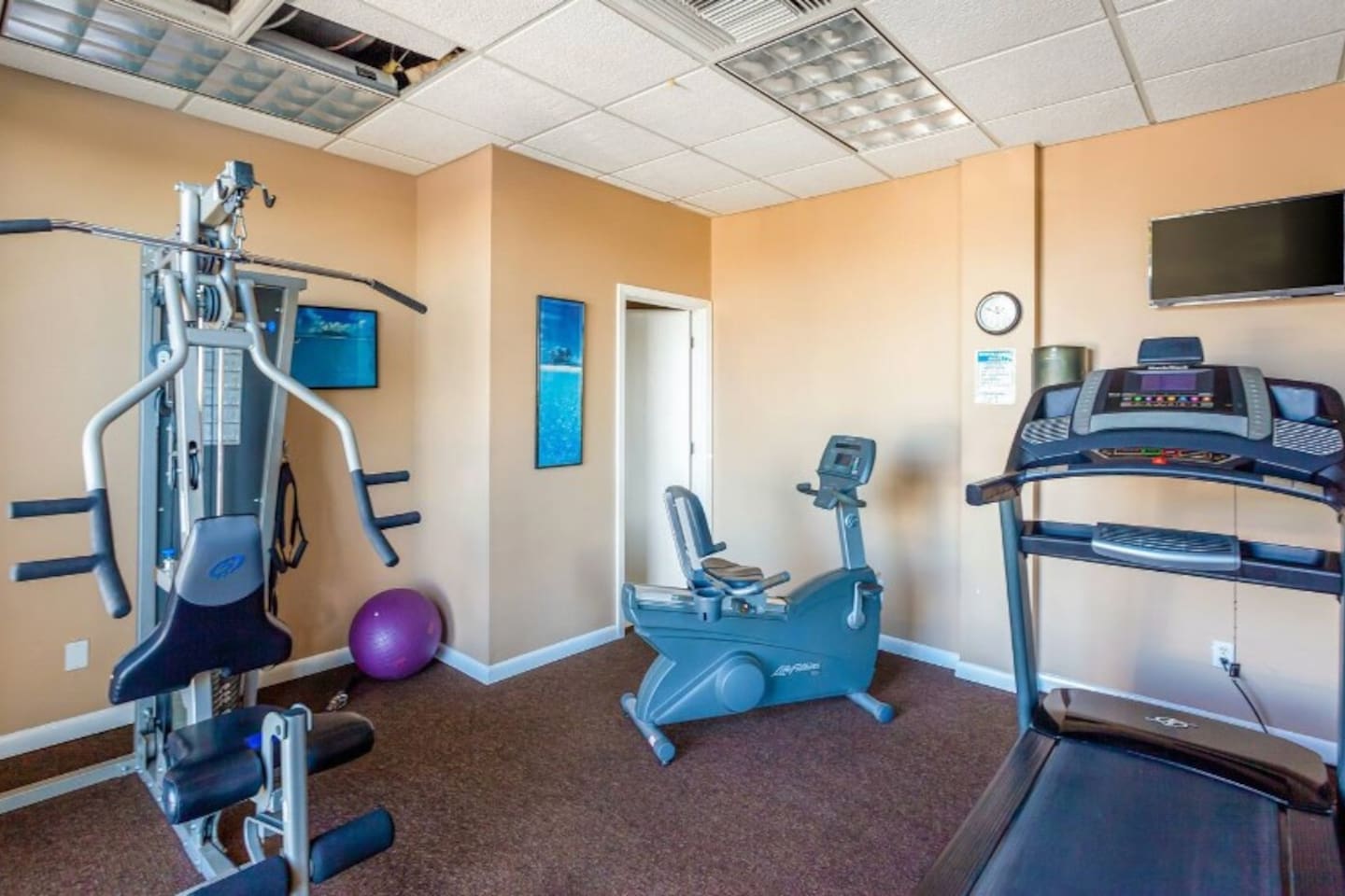 On-site gym - get your cardio in while you're here. Not pictured is also a set of free weights.