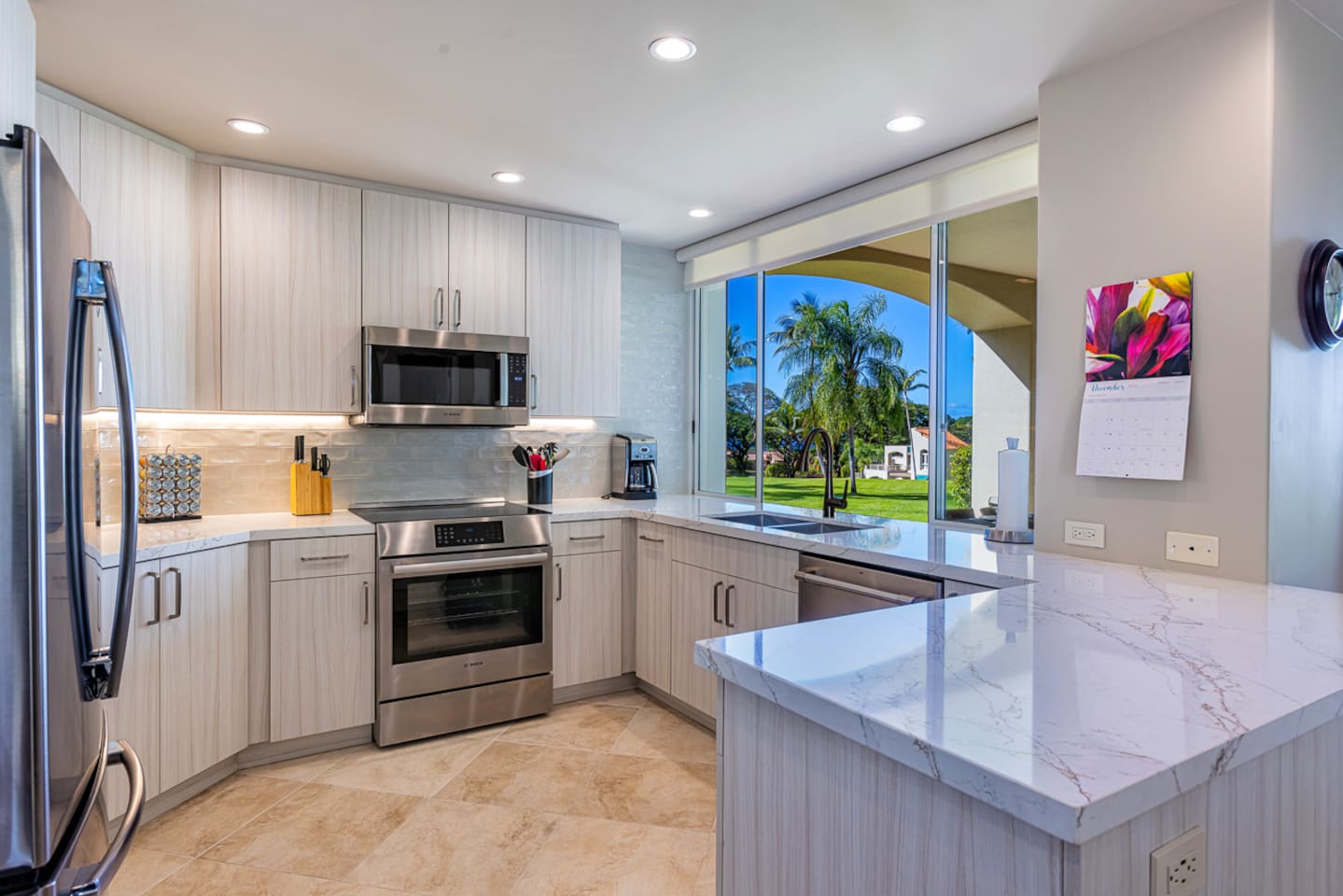 our newly remodeled kitchen with new Bosch induction stove and stainless steel appliances