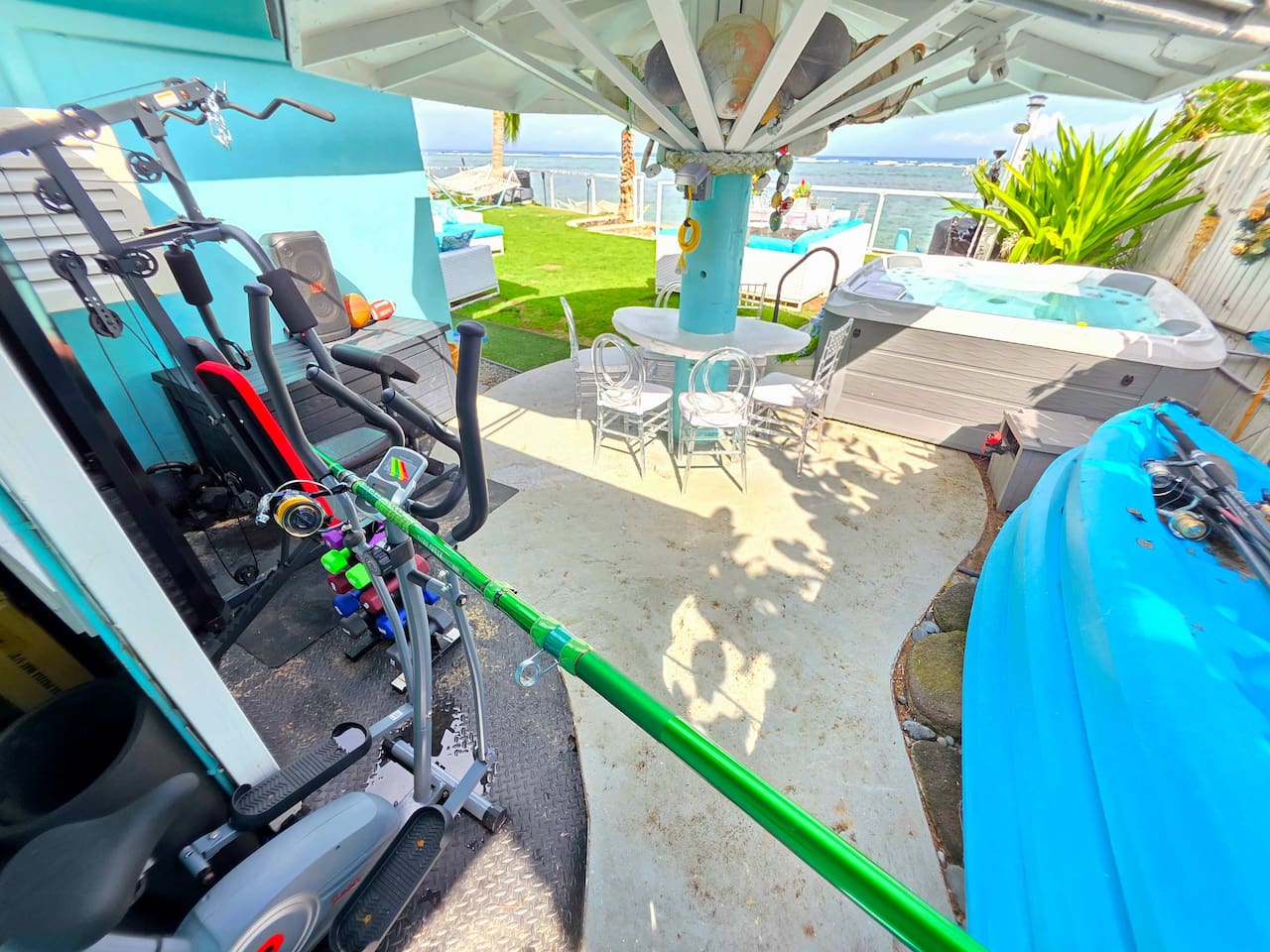 Beachfront gym of dreams in a beachfront gazebo with electrical outlets for laptops & phone charging, sauna, 7-person jacuzzi, kayaks, fishing poles, and chest with tons of snorkeling gear, watersports and sporting gear.