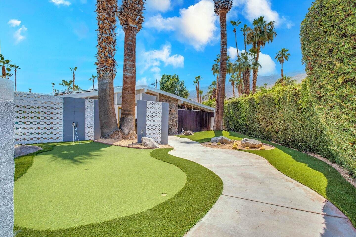 Putting green with putters and golf balls for your use!
