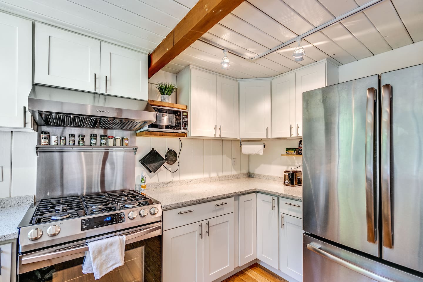 The kitchen is a dream to cook in. A perfect, cozy, warm space to make your morning coffee.