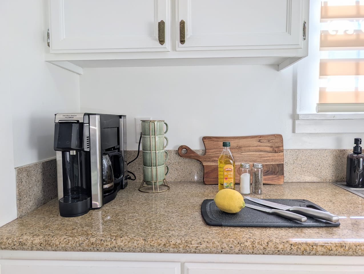 Fully equipped kitchen with coffee maker and everything you need for home-cooked meals.