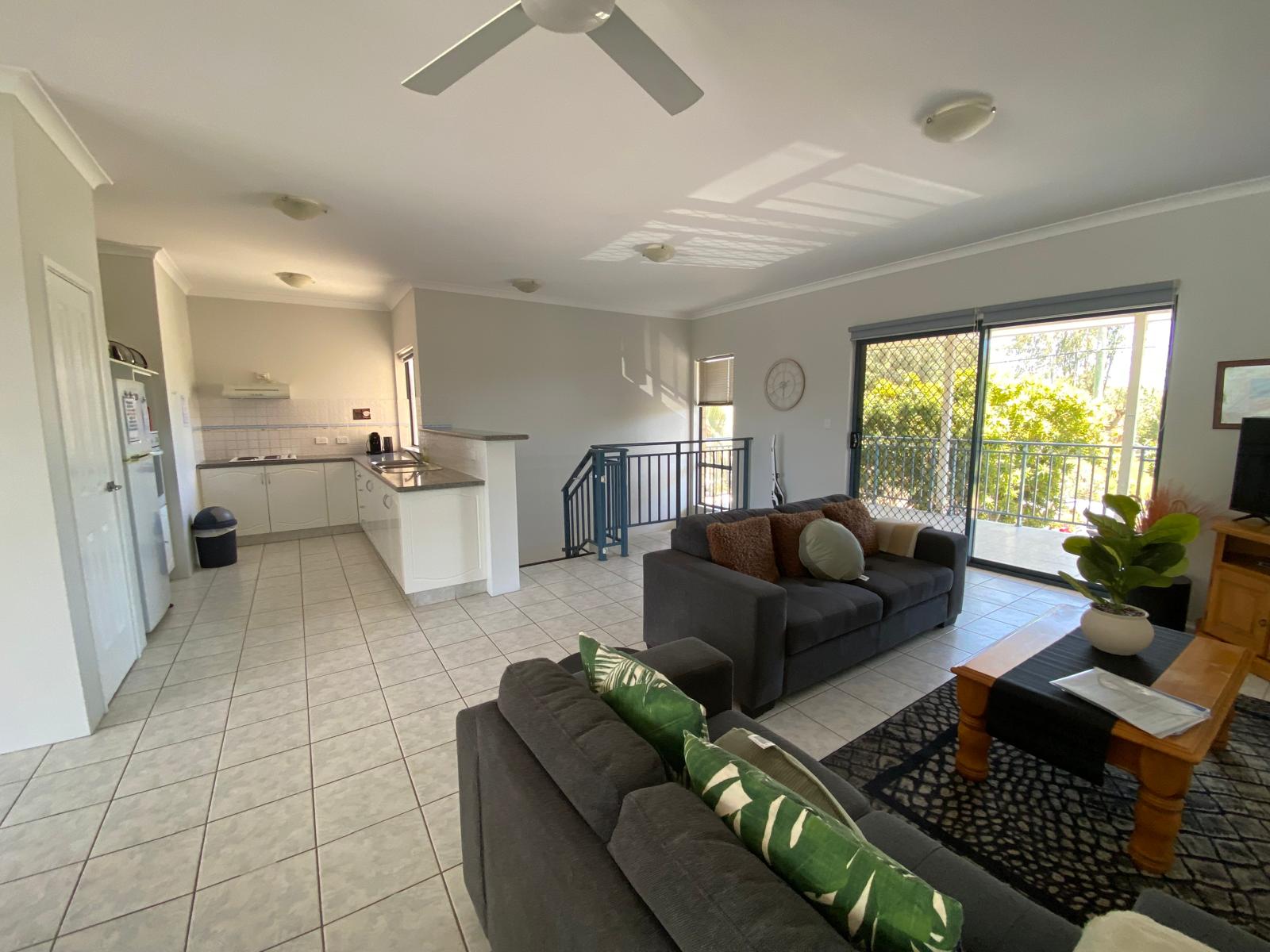 Open plan living with entrance to front balcony
