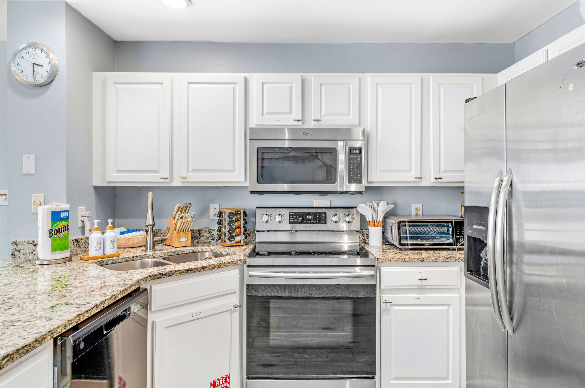 The kitchen includes an air fryer for convenient, healthy meals, a rice cooker, and a Keurig Duo coffee maker for your favorite brews. Dish/Hand soap provided for your cleaning needs.