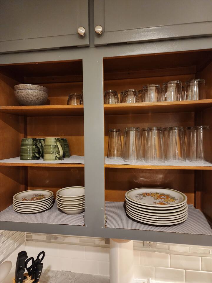 Cabinet fully stocked for a nice family dinner. 