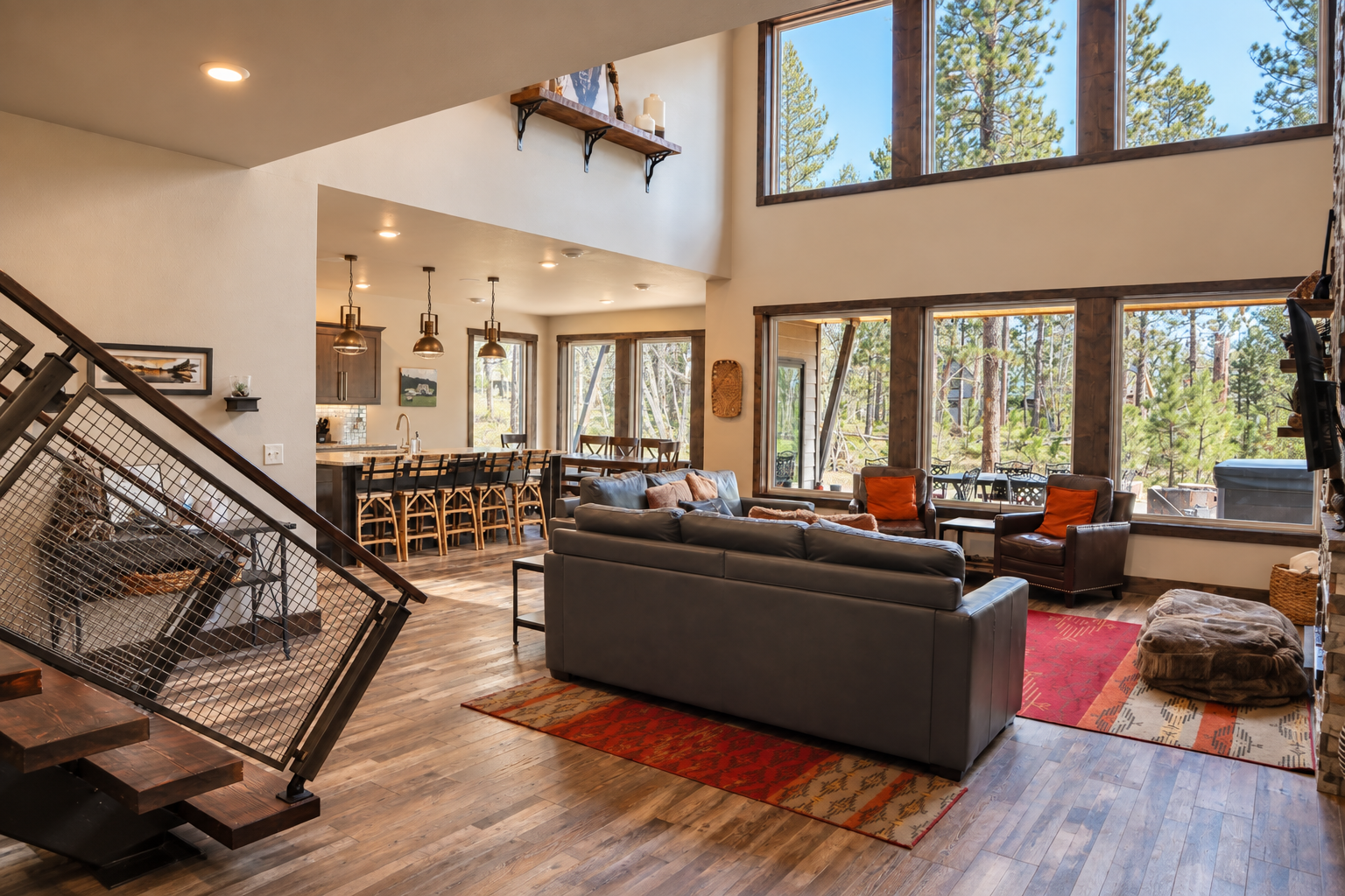 Open concept living room, kitchen and dining area.