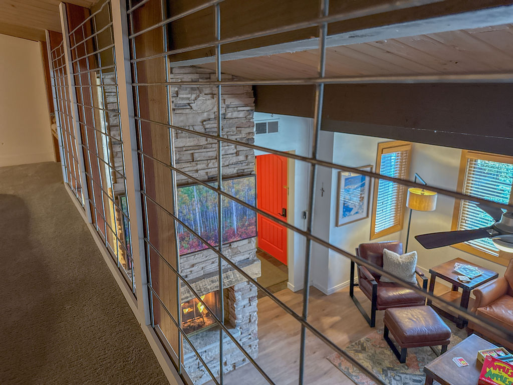 cozy living room, and even the views out the large living room windows.