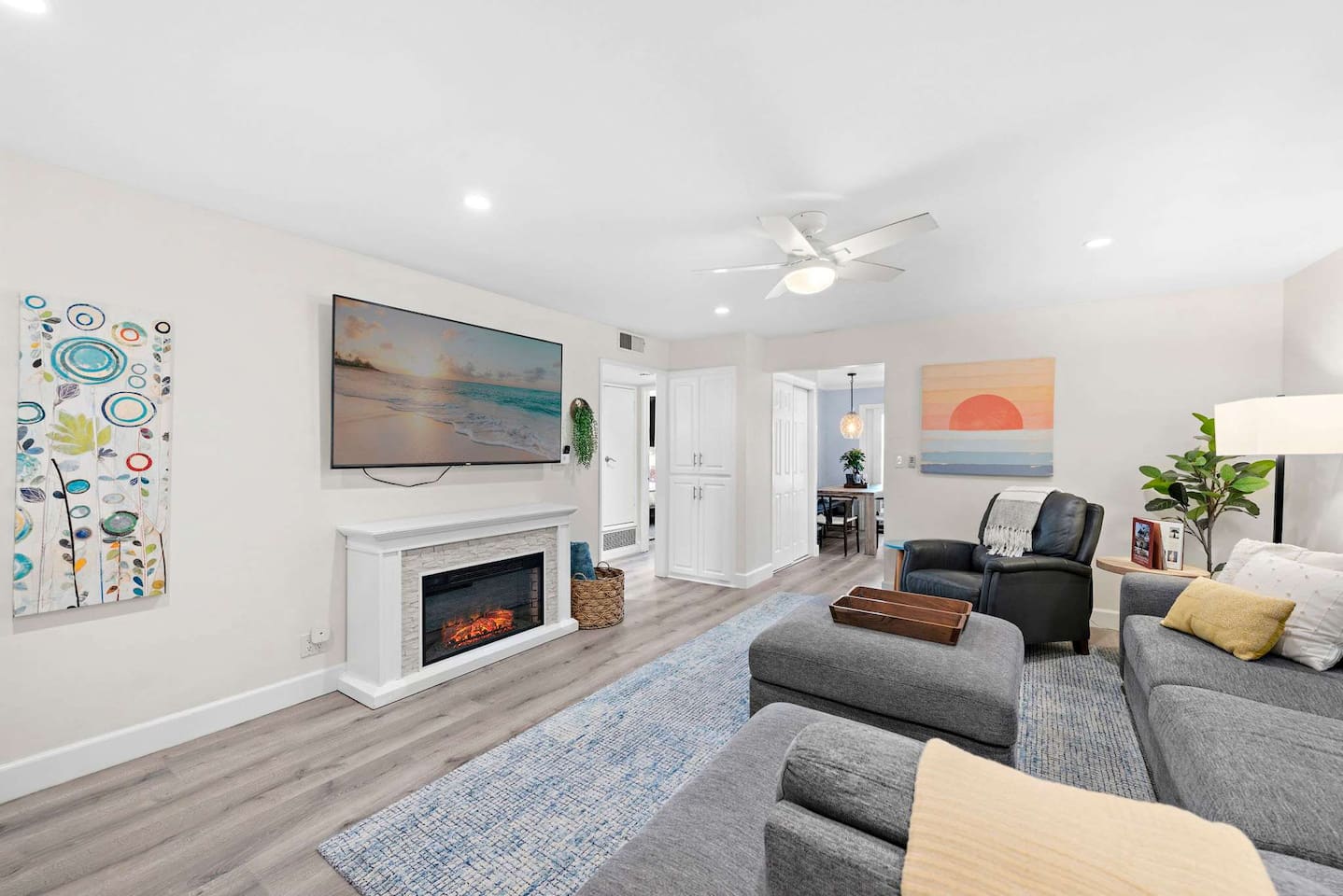 Just inside the front door is a spacious Living Room with lots of natural light and plenty of seating with a comfy sectional and a recliner.