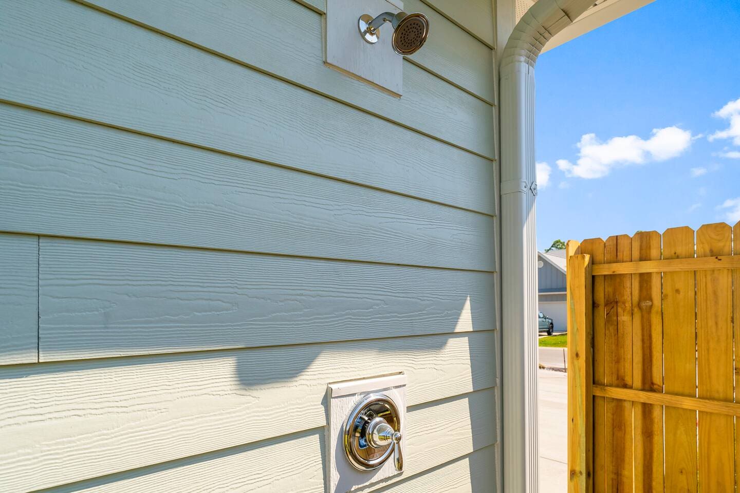 Enjoy coastal living with a refreshing outdoor shower at home.