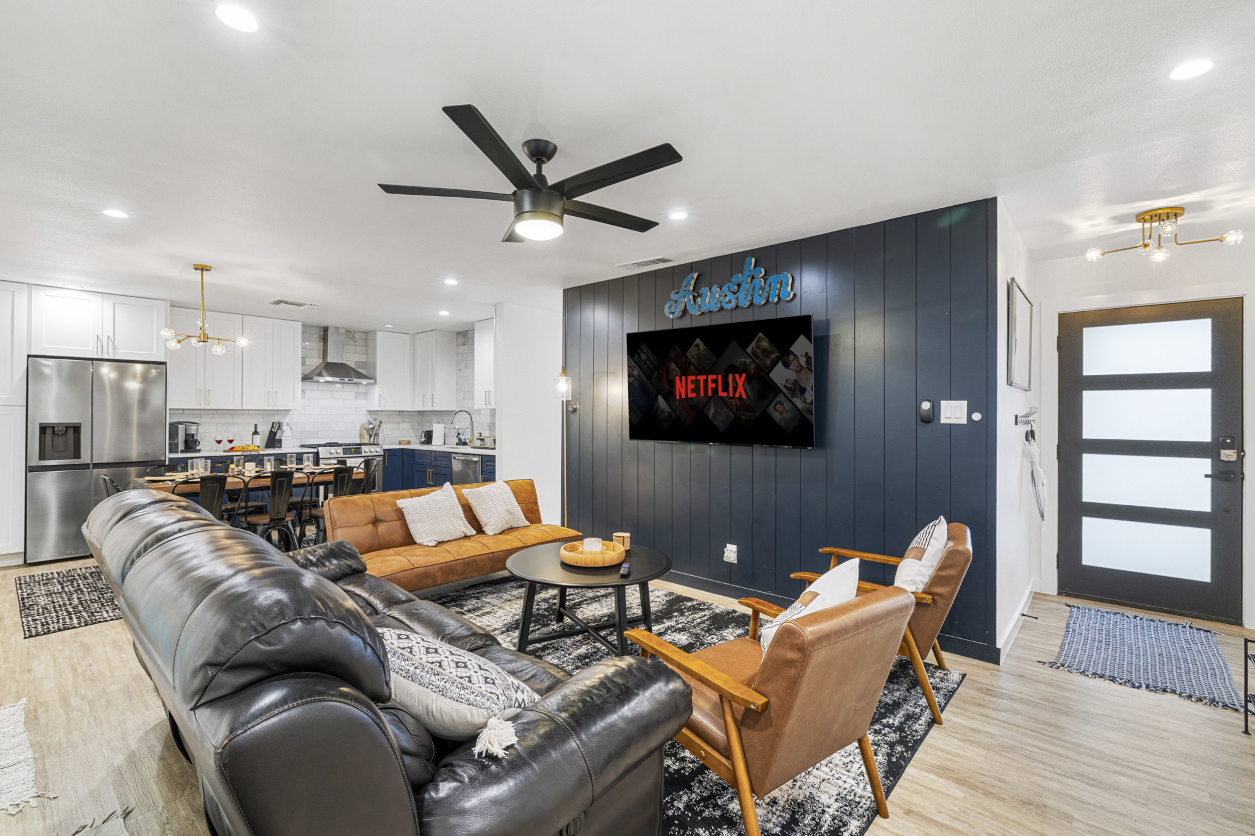 Stylish space with sleek furniture, perfect for movie nights or gathering with friends!