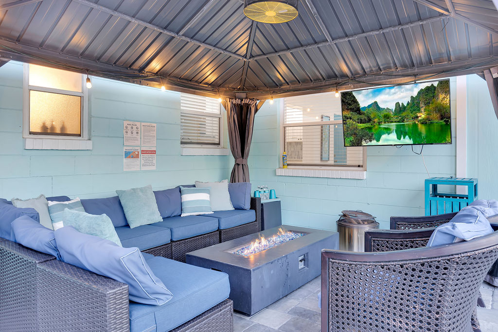 Outdoor seating w/ fireplace and smart TV