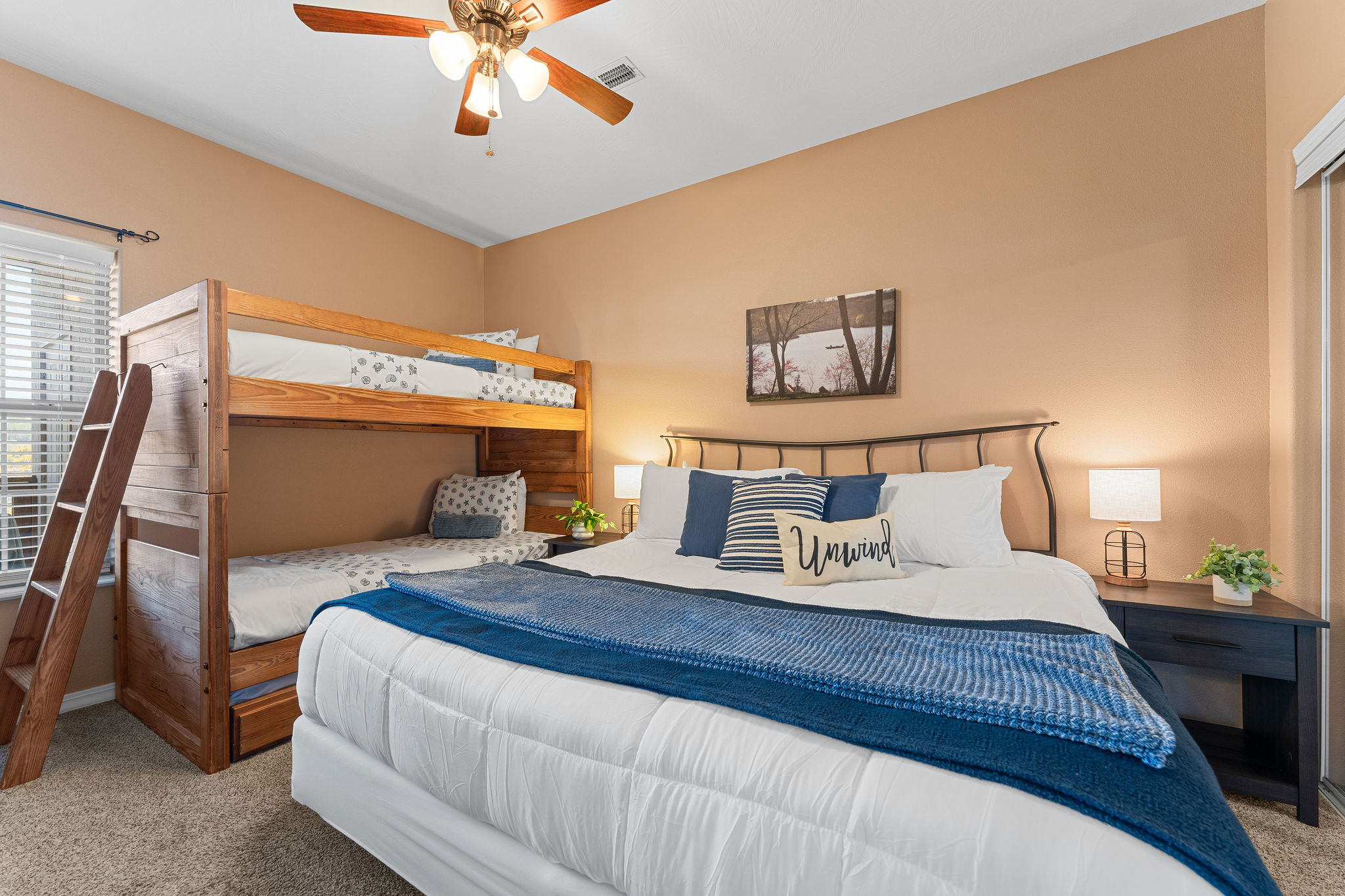 The third bedroom has a king bed and twin over twin bunks