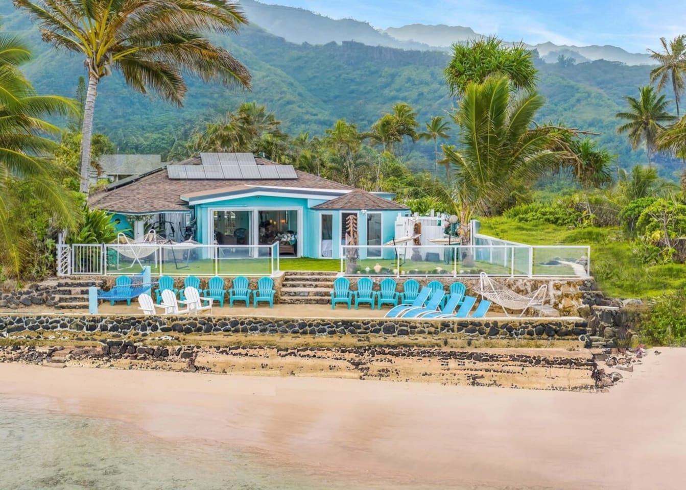 Tranquil bliss at home with private beach, waterfalls, Jurassic Valley Sea Cliffs, turquoise snorkeling reef, 80-inch Samsung 8K Home Theater System,7 two-person double-capacity hammocks,beachfront gym & gazebo with electrical outlets for laptops.
