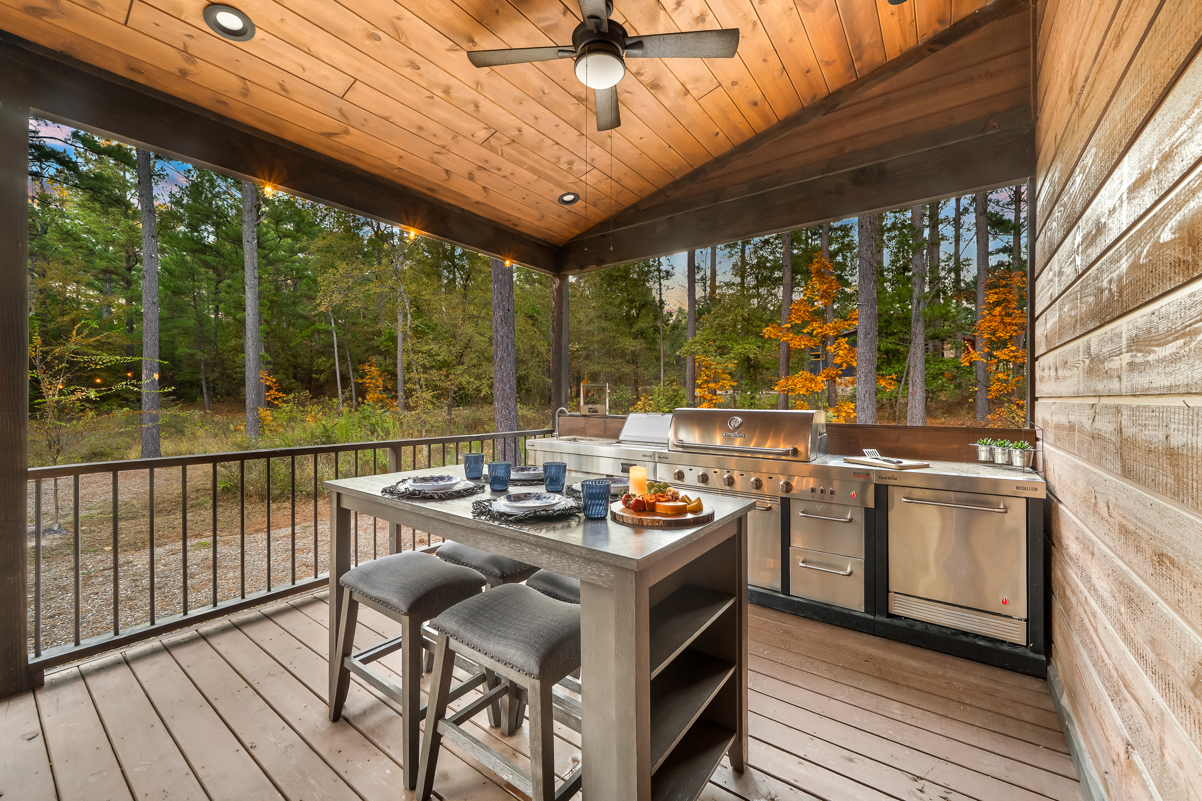 Generous grill station with ample counter space and bar seating so every meal can be prepped, plated, and enjoyed outdoors.