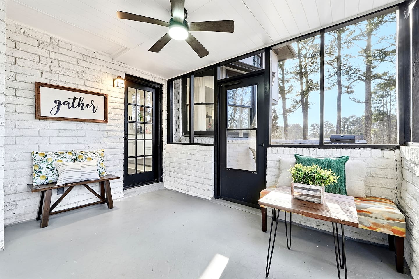 Inviting and spacious sunroom featuring ample seating, perfect for relaxing, unwinding, or spending quality time together.
