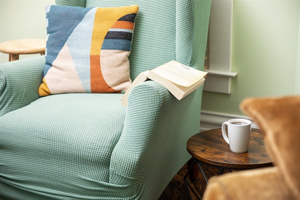 Sit back and relax with a hot coffee and something good to read - the perfect quiet moment.