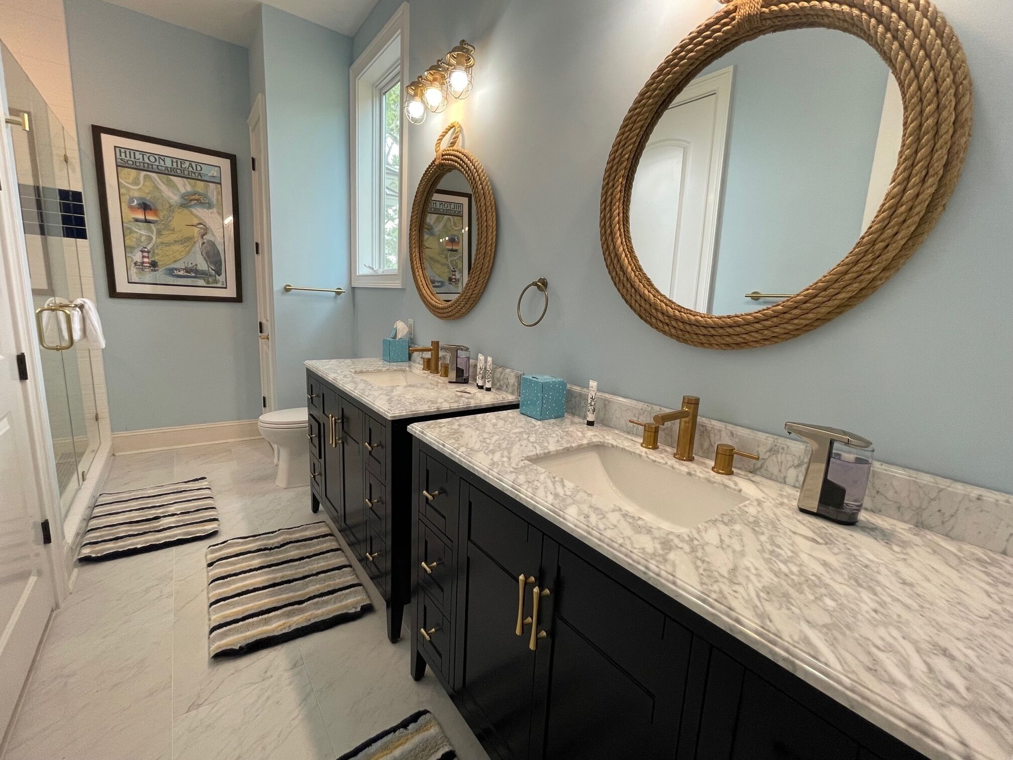 Anchor's Down bathroom has nautical theme with 2 vanities