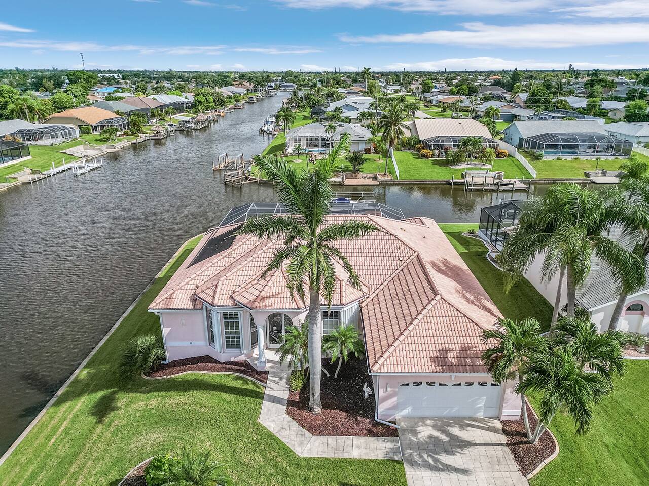 Stunning aerial views of Villa Heidi with breathtaking Gulf access and intersecting canals!