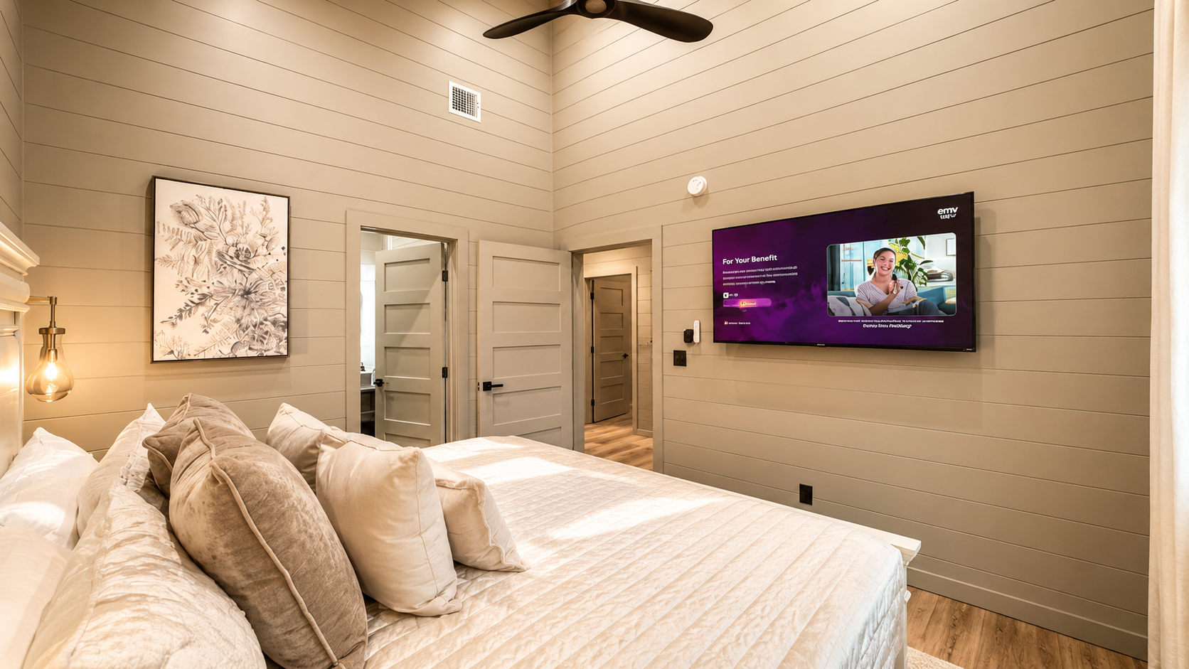 Bedroom Retreat: Stylish decor, plush bedding, and a TV for your evening entertainment!