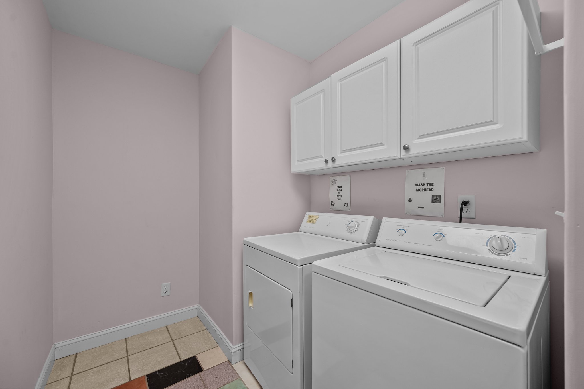 Convenient laundry room with washer and dryer — pack light and stay fresh