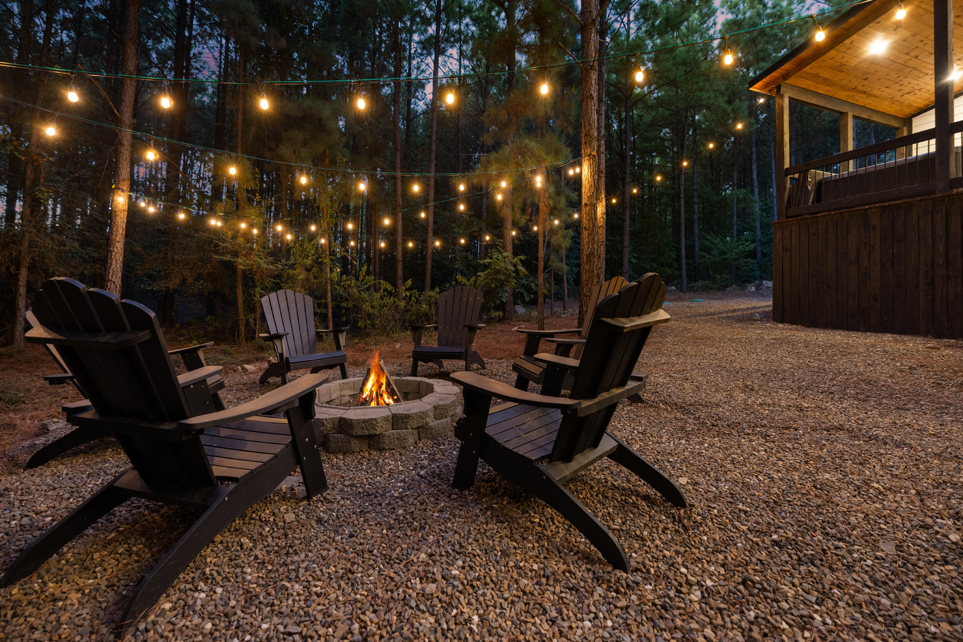 As the sun goes down, the forest gets quiet and the string lights begin to glow. Gather around the fire, settle into the Adirondacks, and enjoy peaceful nights that makes you forget about everything.