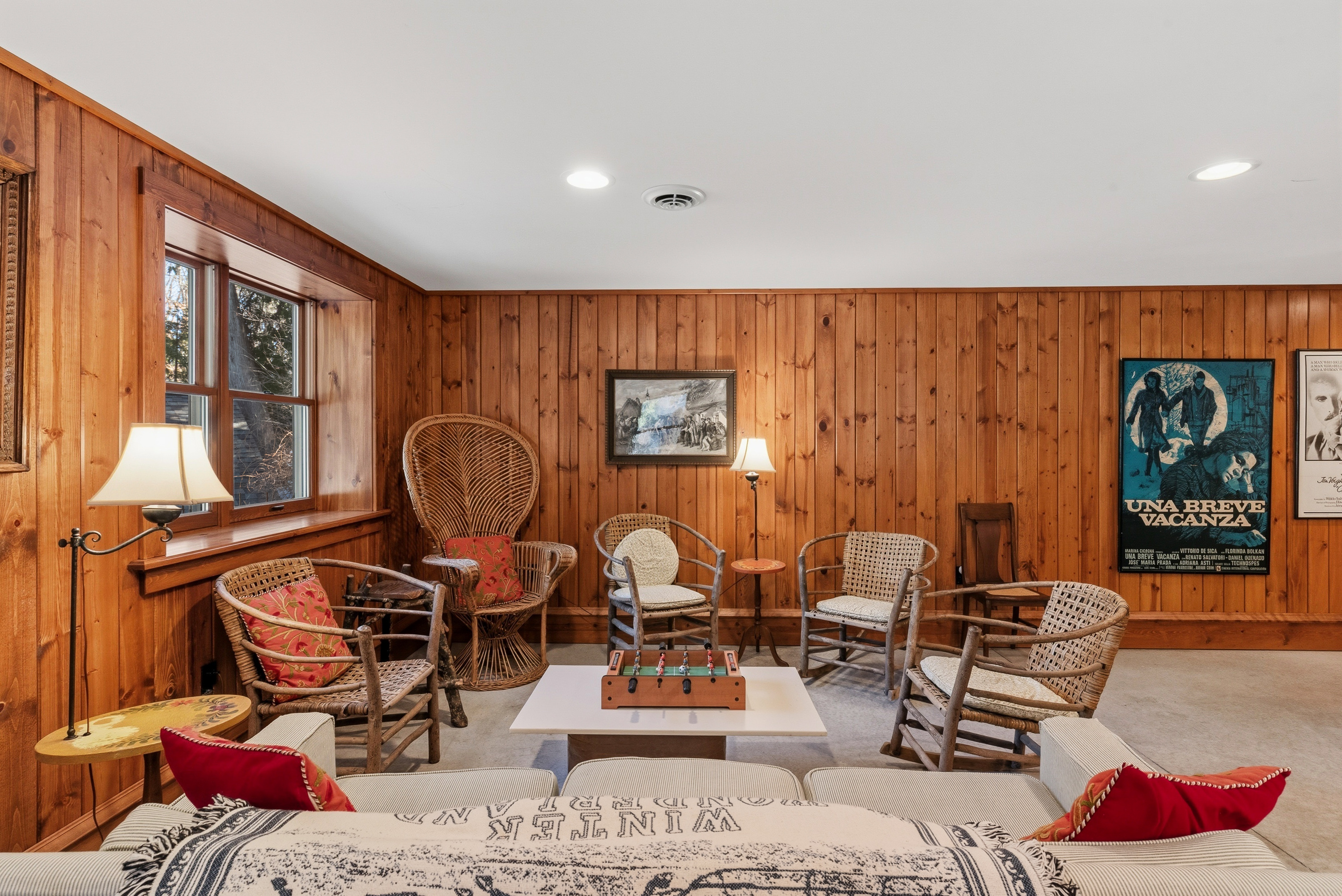 Walkout level game area w/ tabletop foosball for casual fun