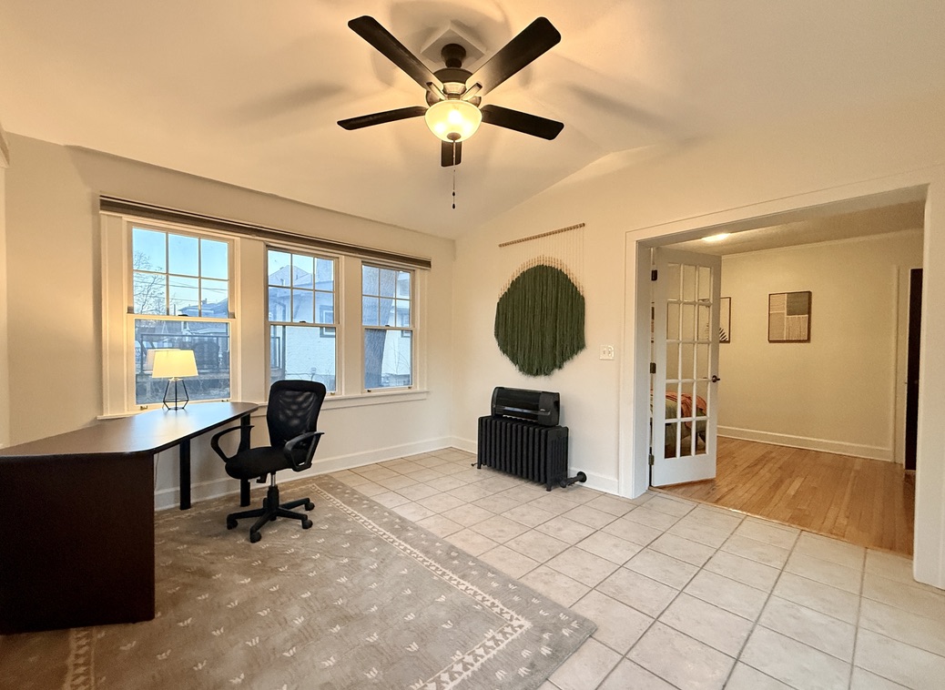 Dedicated office in a beautiful 4-season sunroom with an egress door for your afternoon breaks.