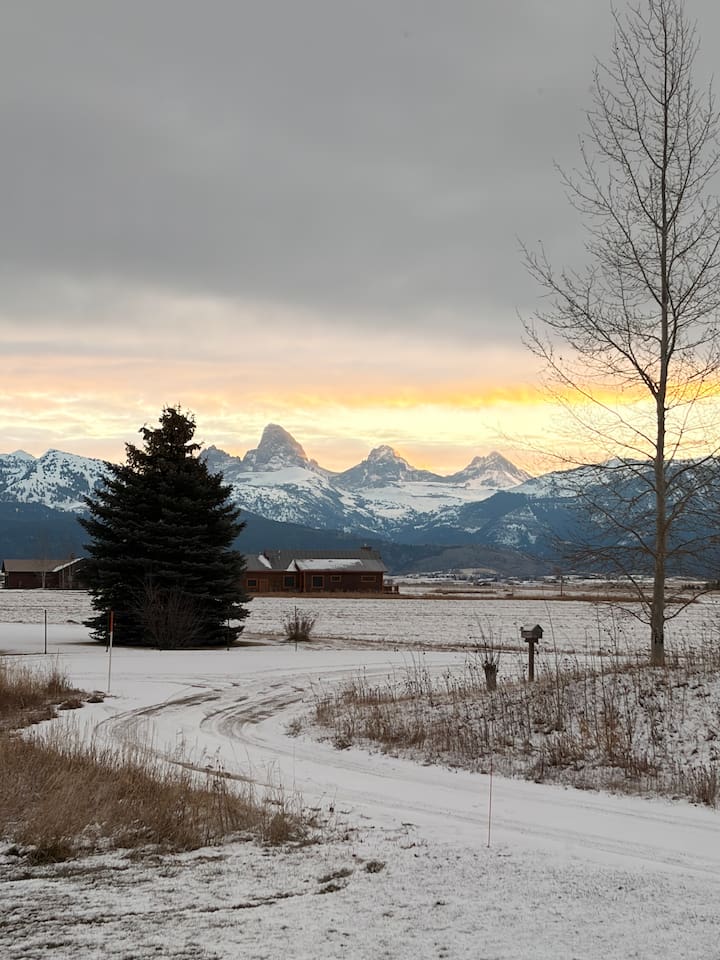 Wake up to stunning views of the Teton range, where snow-covered peaks and wide-open space create a picture-perfect backdrop for your stay.  This will become your happy place!