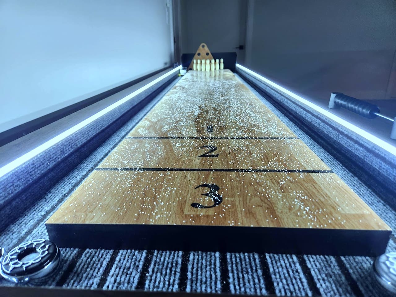 American Legend Shuffle board for endless fun , with bowling and LED lighting