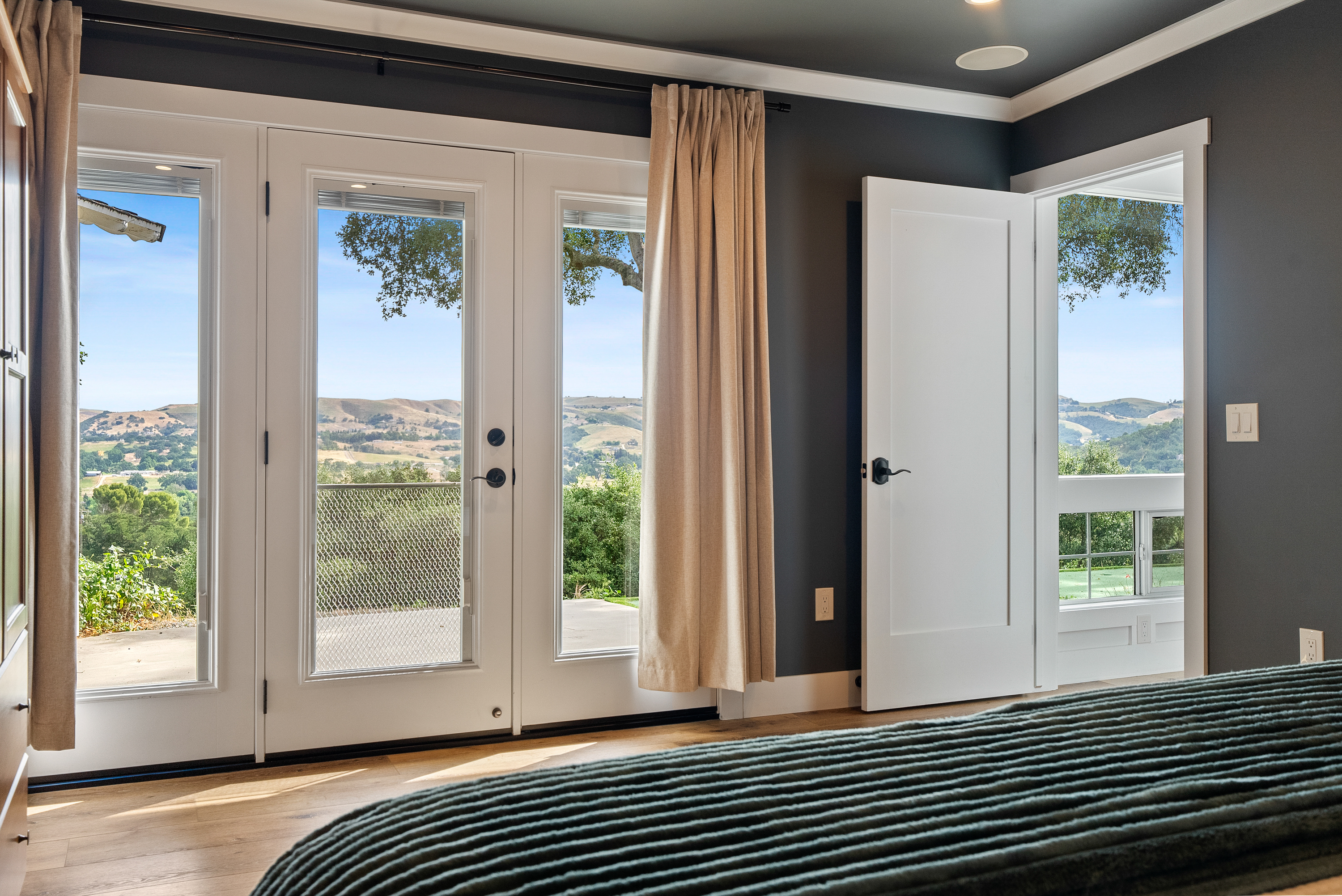 A tranquil retreat with stunning valley views right from your bedside.