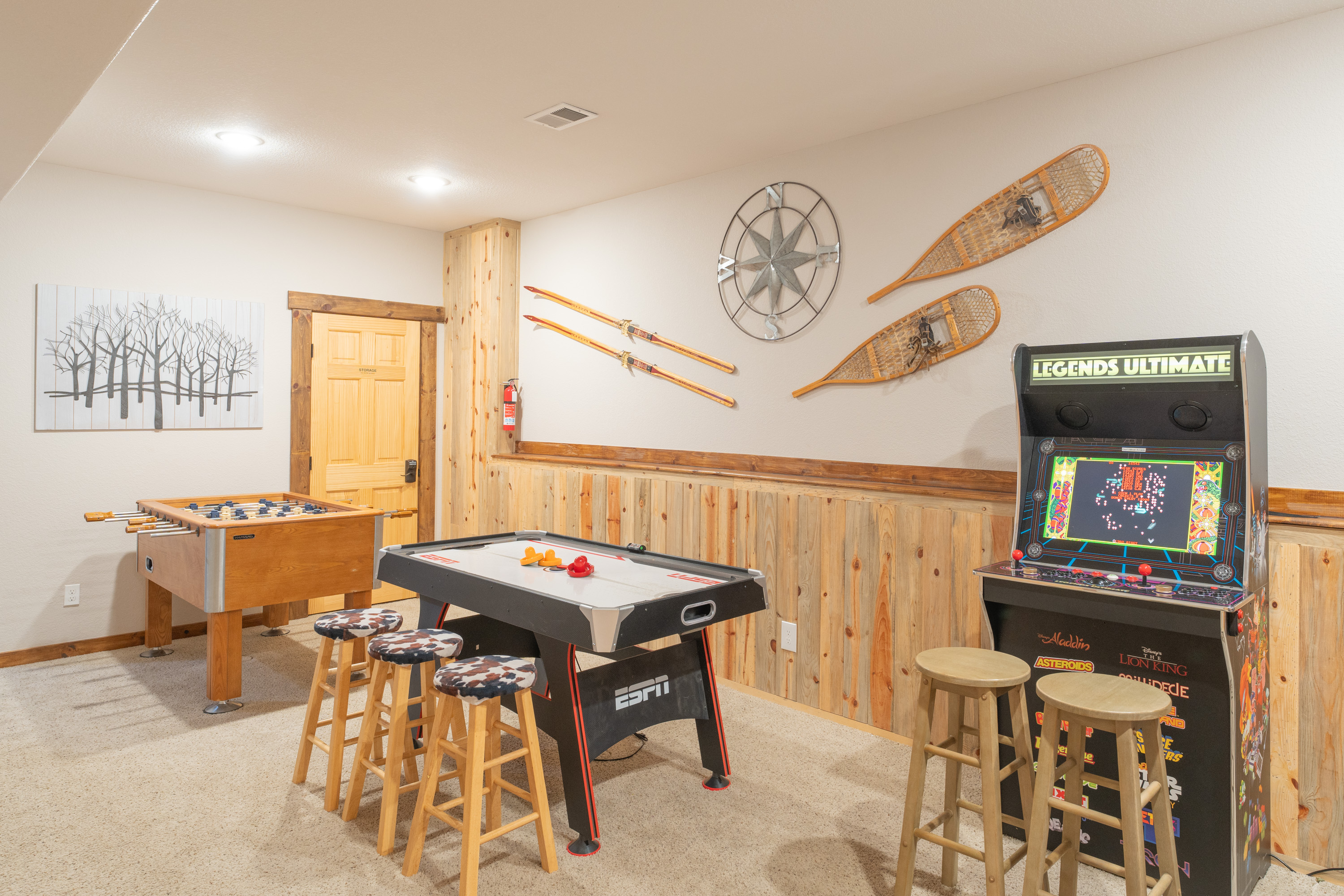 Endless fun awaits in our game room featuring air hockey, foosball, and a classic arcade! Perfect for family game nights.