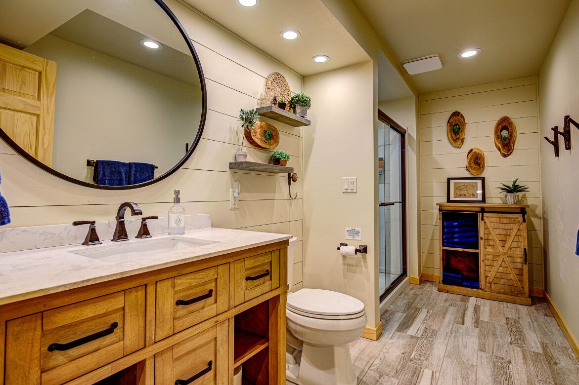 Lower level bathroom, services 2 lower level bedrooms and rec room.